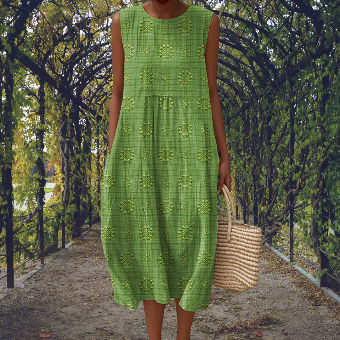 Amandine – Robe midi fluide sans manches avec poches