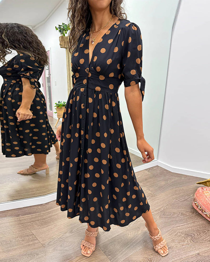 Caterina – Robe midi à pois col V effet sculptant