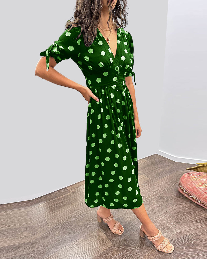 Caterina – Robe midi à pois col V effet sculptant