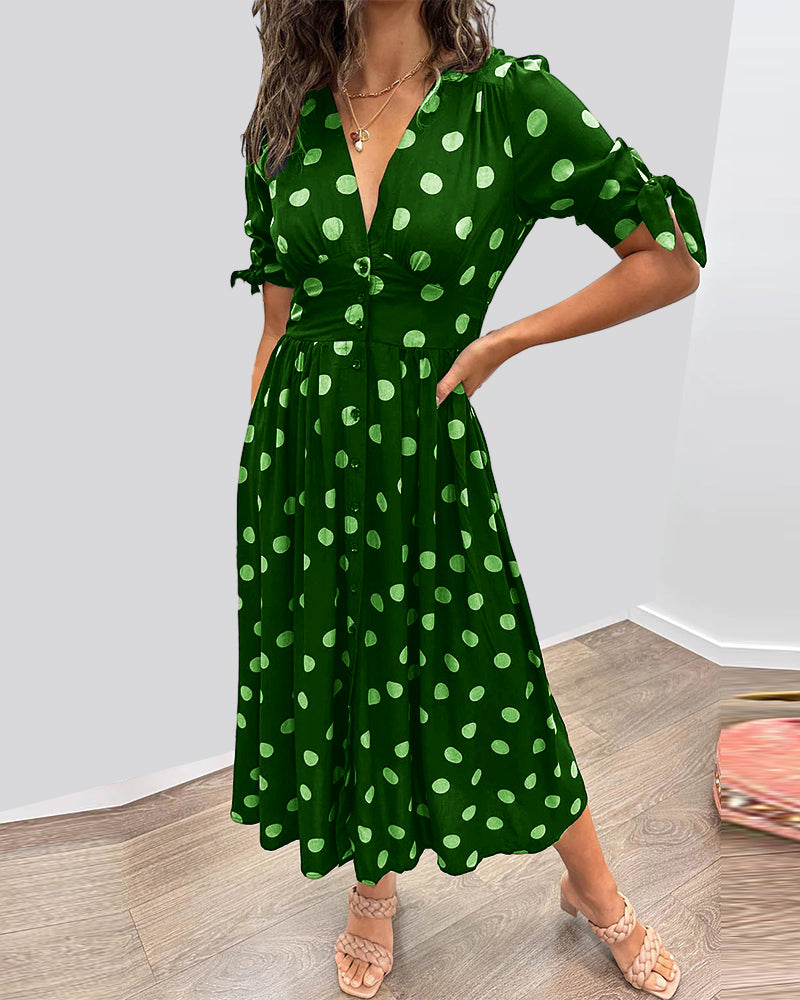 Caterina – Robe midi à pois col V effet sculptant