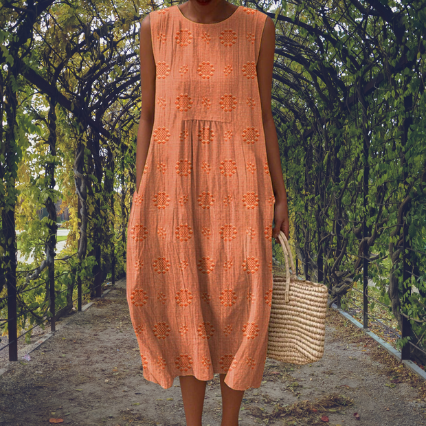 Aline – Robe midi fluide sans manches avec poches