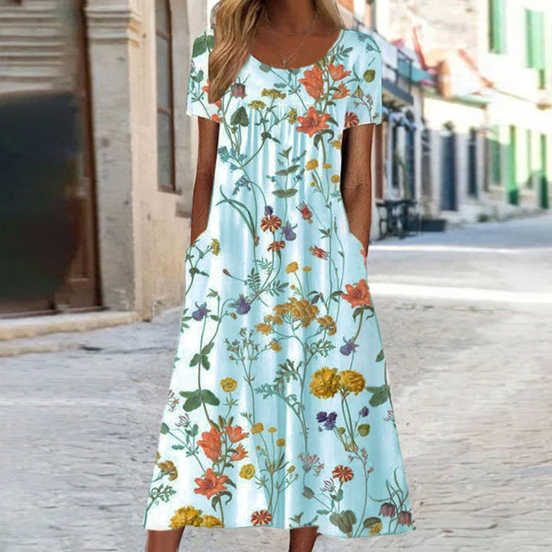 Léora – Robe fluide fleurie effet ventre plat