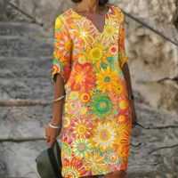 Nira – Robe midi fluide fleurie et élégante