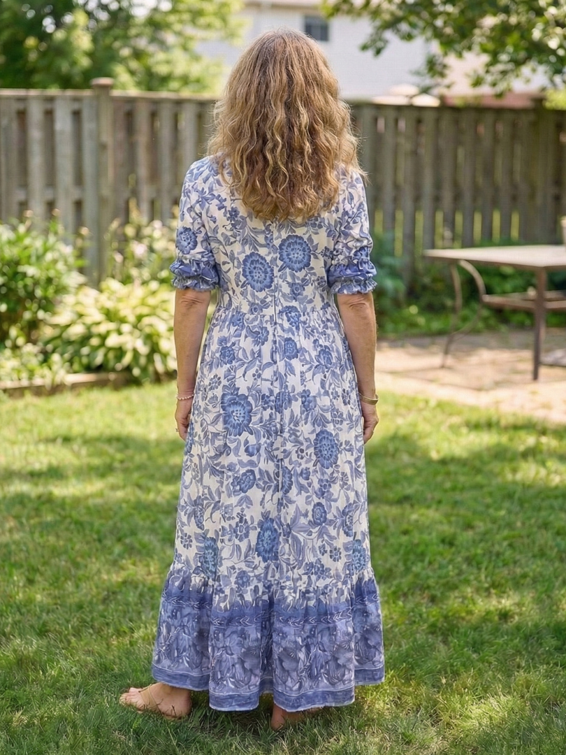 Clara – Robe midi fluide fleurie