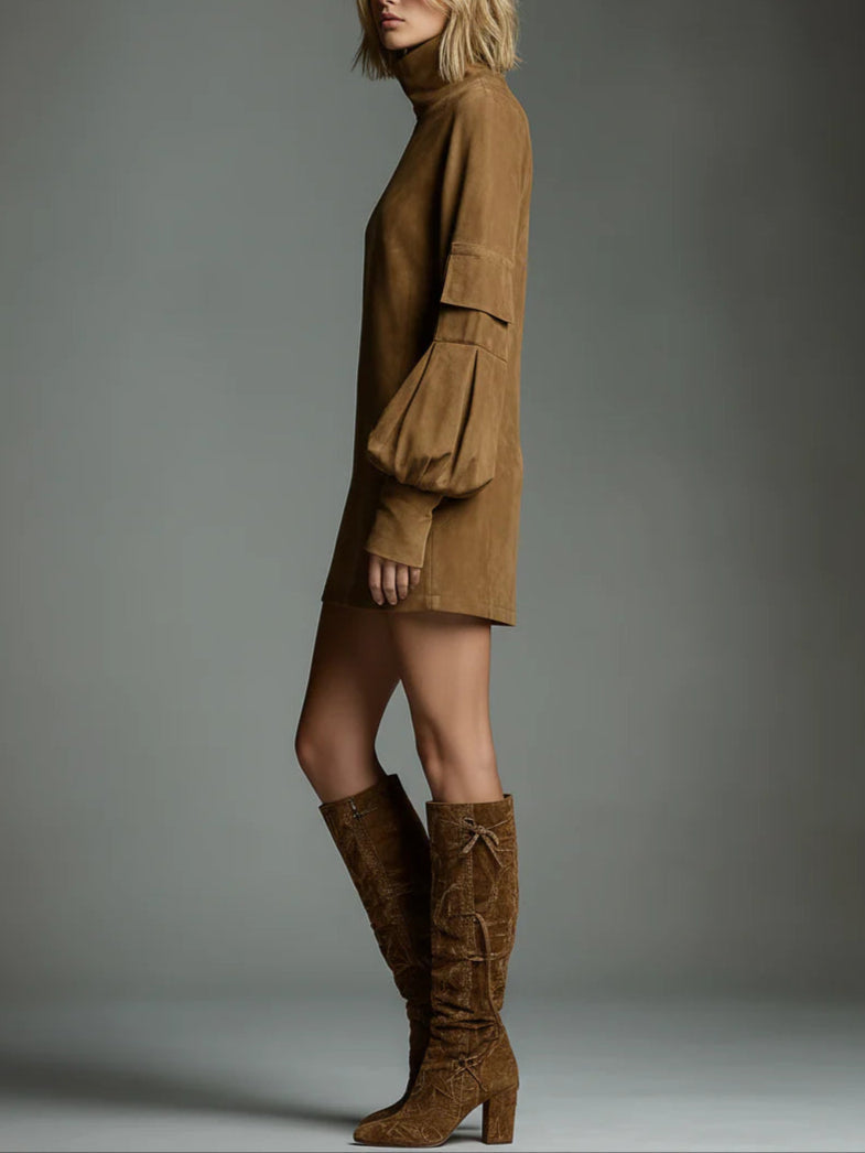 Bertille de profil avec des bottes hautes
