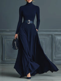 Mélisande | Robe longue en maille bleu nuit à col montant