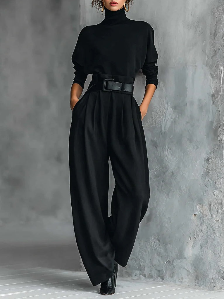 Pénélope, ensemble noir col roulé et pantalon large ceinturé, vu de face