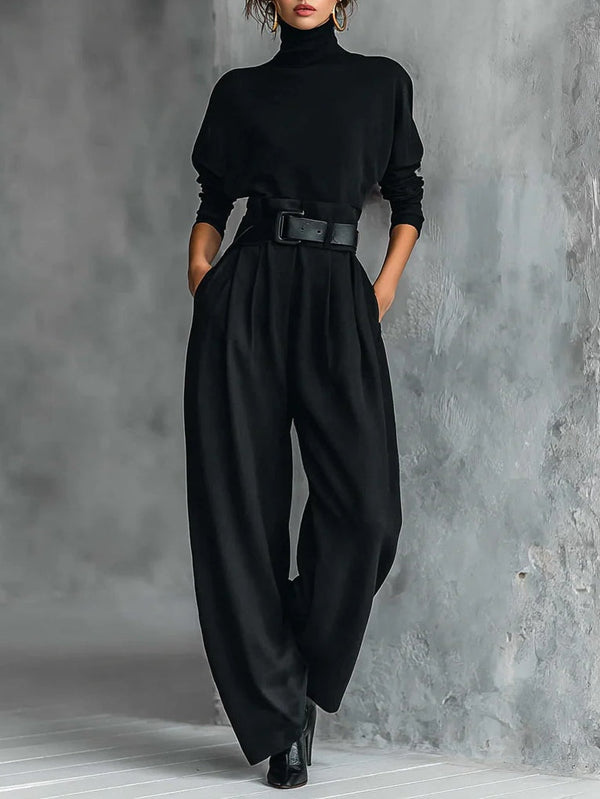 Pénélope, ensemble noir col roulé et pantalon large ceinturé, vu de face