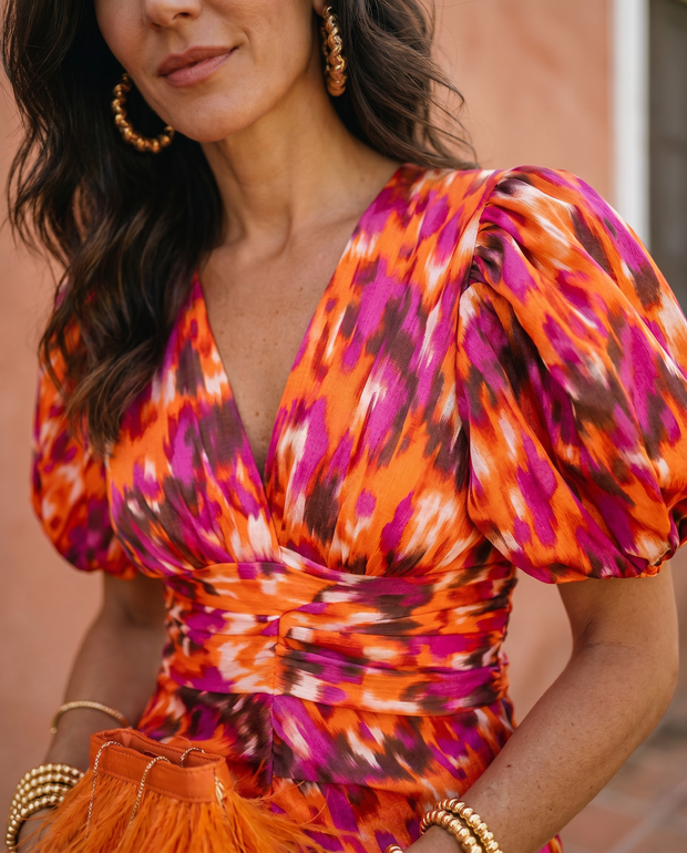 Carla | Robe midi fleurie à manches bouffantes